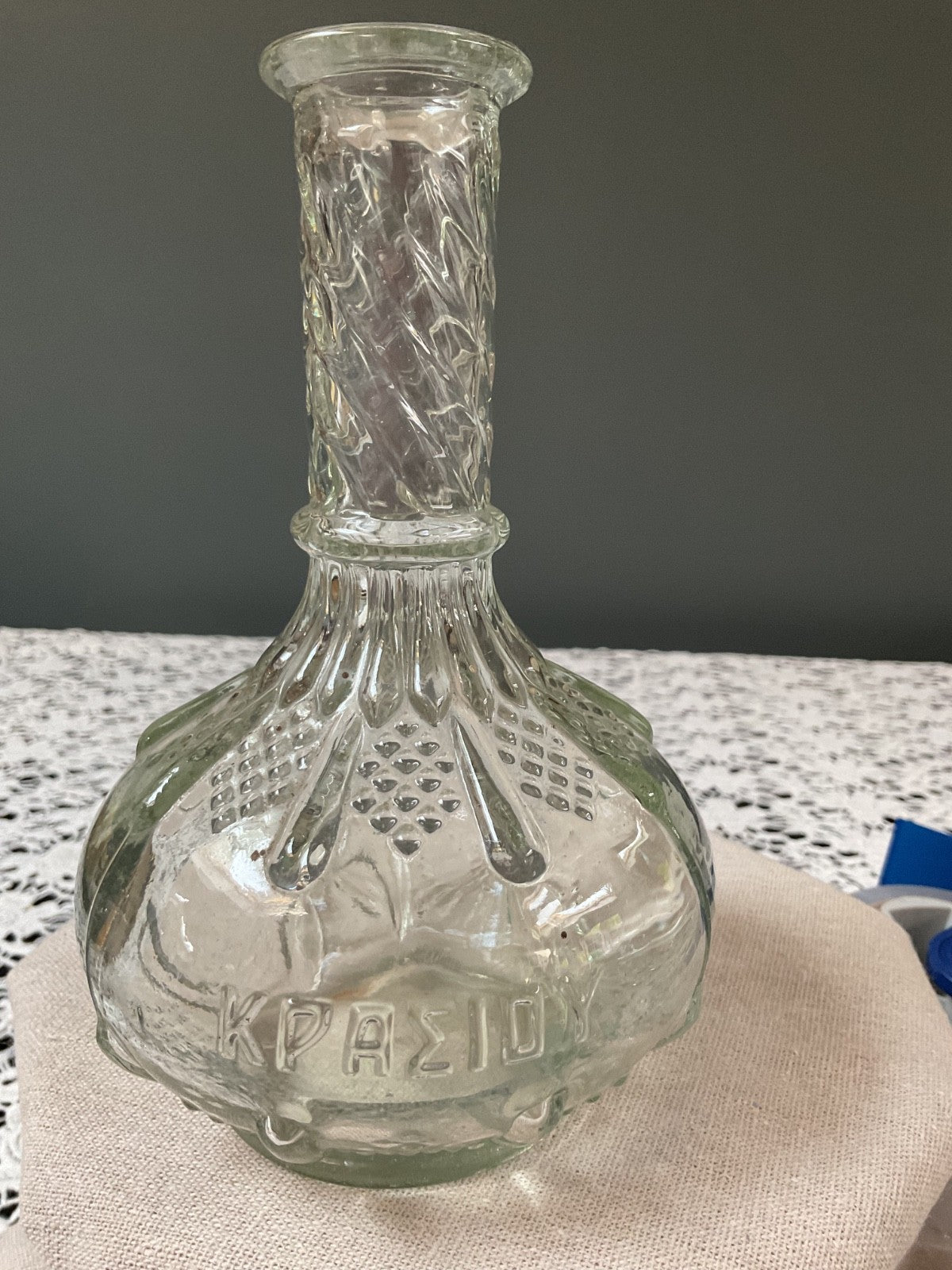 Vintage Greek Clear Glass Bottle – Embossed Classical Figures